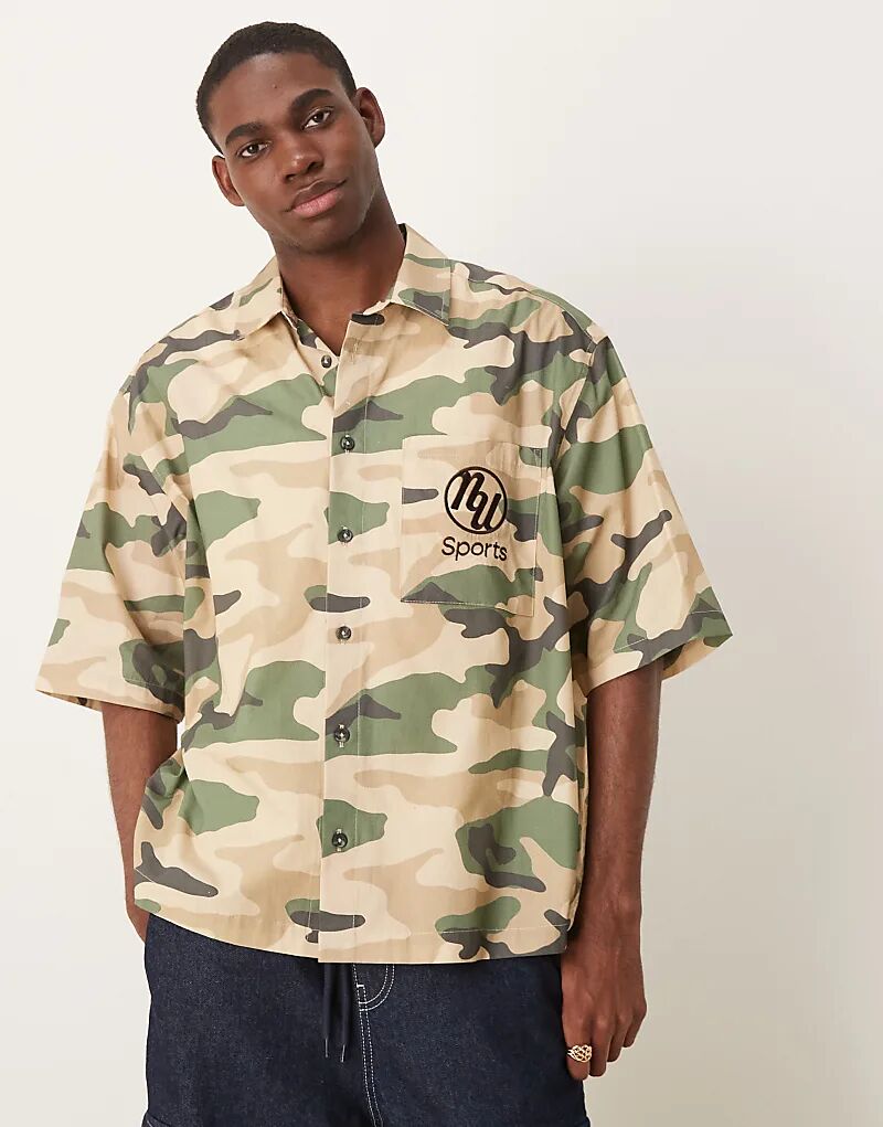 Рубашка свободного кроя ASOS DESIGN с вышивкой на груди и камуфляжным принтом 
Рубашка свободного кроя ASOS DESIGN с вышивкой на груди и камуфляжным принтом