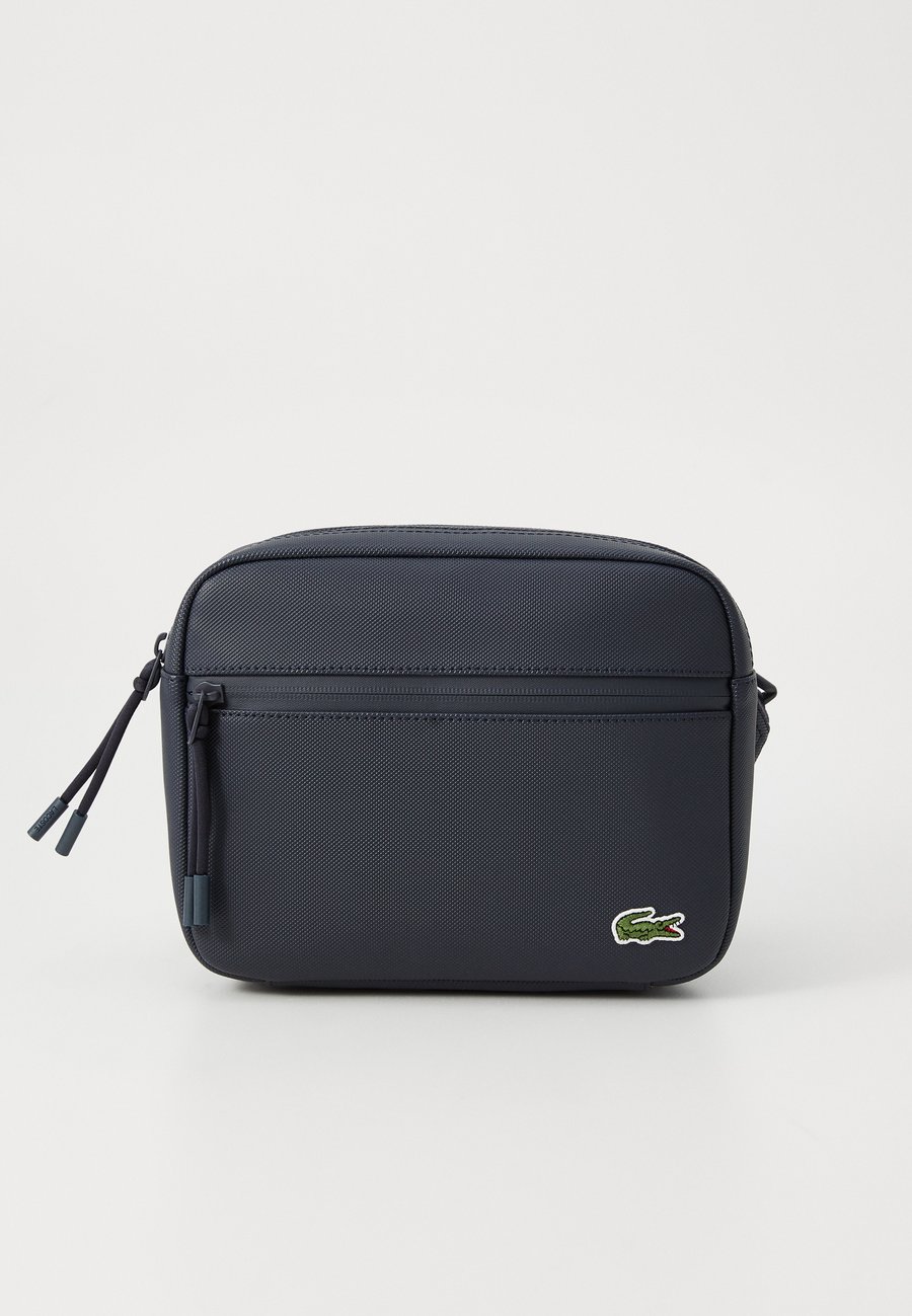 Сумка кросс-боди Lacoste REPORTER BAG UNISEX, Eclipse/Dark Blue
Сумка кросс-боди Lacoste REPORTER BAG UNISEX, Eclipse/Dark Blue