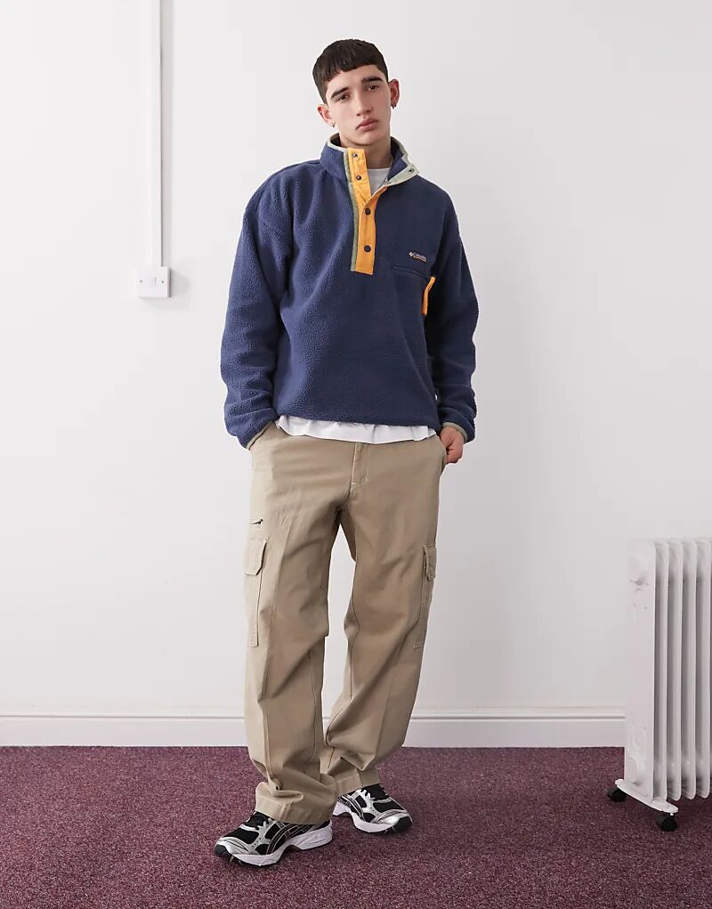 Columbia – Helvetia II – Темно-синий флисовый свитер с короткой планкой на кнопках
Columbia – Helvetia II – Темно-синий флисовый свитер с короткой планкой на кнопках