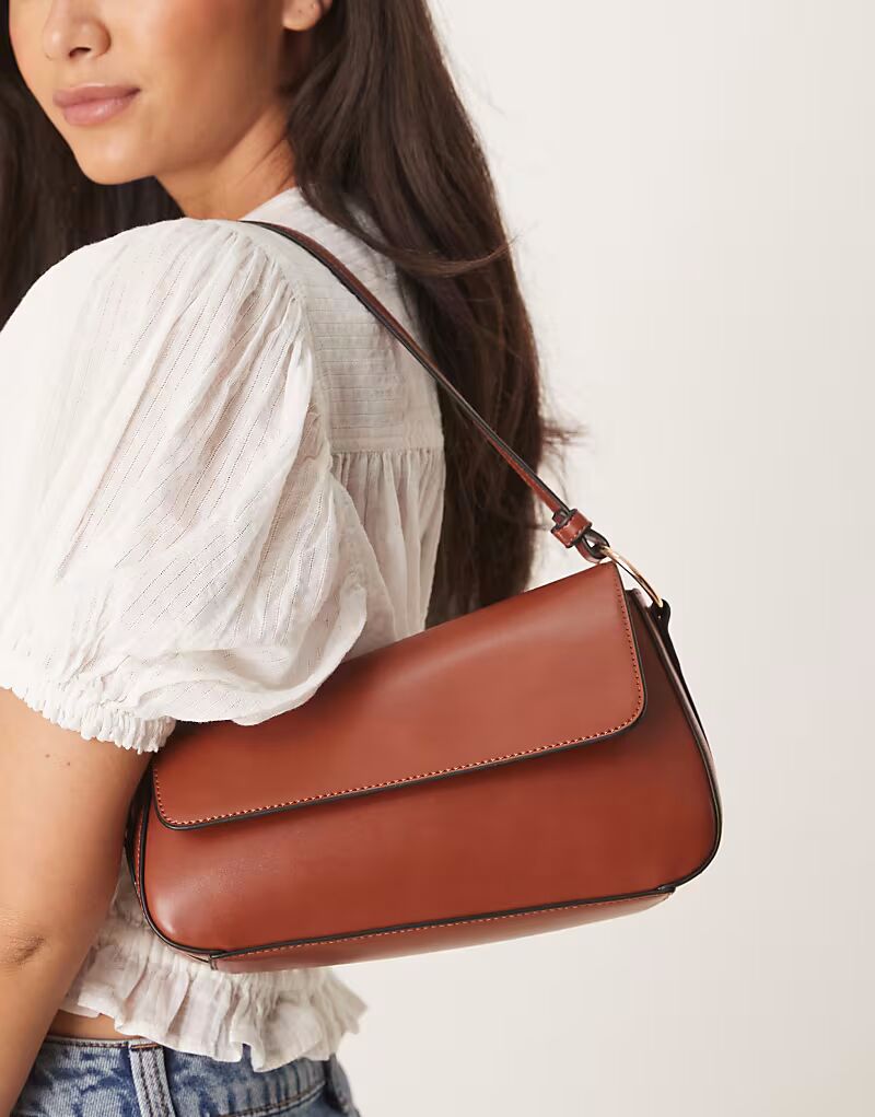 Сумка через плечо ASOS DESIGN асимметричного кроя с передним клапаном темно-коричневого цвета
Сумка через плечо ASOS DESIGN асимметричного кроя с передним клапаном темно-коричневого цвета