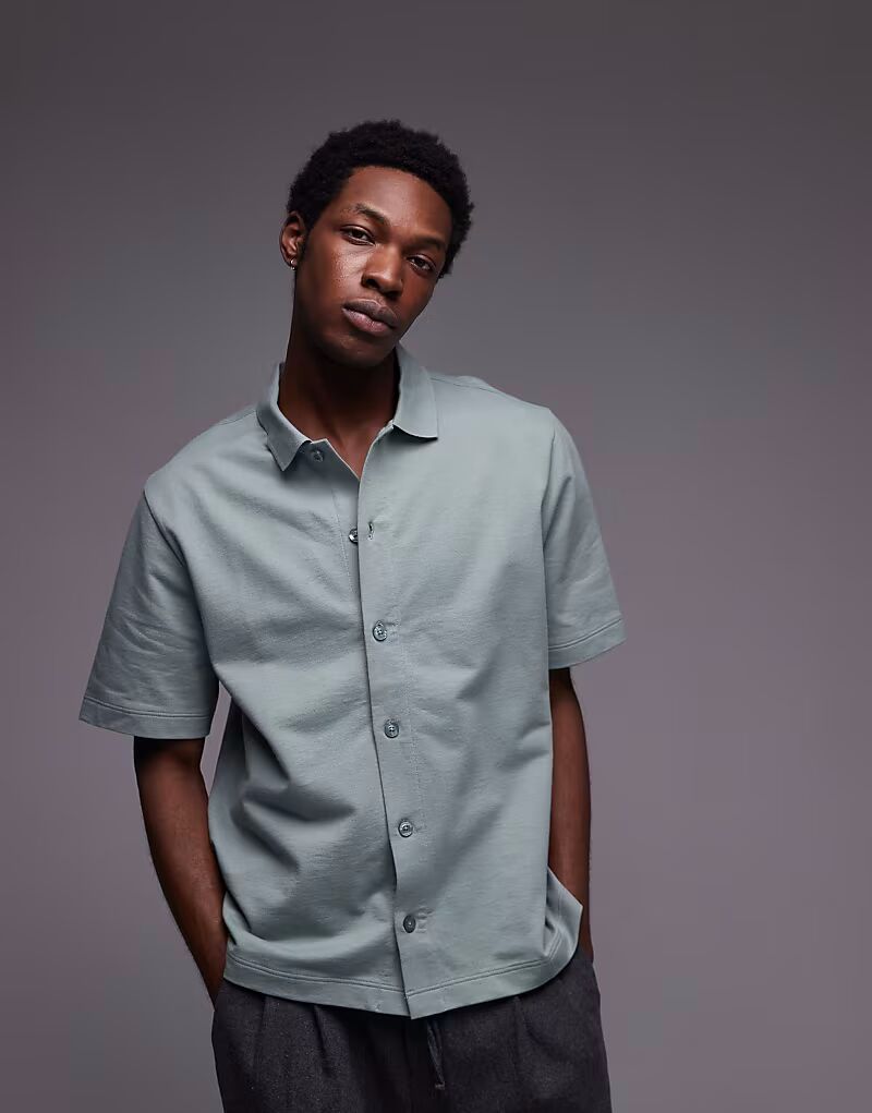 Рубашка Topman свободного кроя на пуговицах в цвете шалфея
Рубашка Topman свободного кроя на пуговицах в цвете шалфея