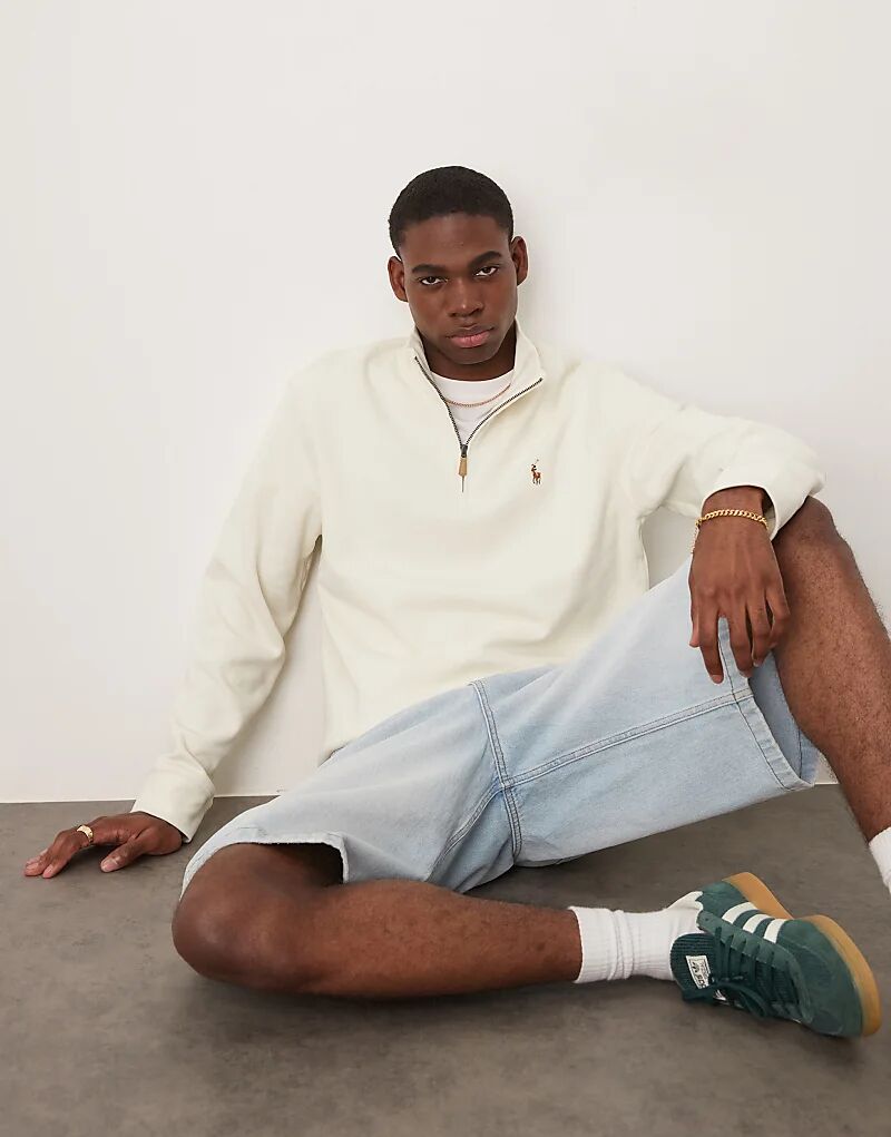 Джемпер Polo Ralph Lauren с длинными рукавами и застежкой-молнией на четверть оборота кремового цвета
Джемпер Polo Ralph Lauren с длинными рукавами и застежкой-молнией на четверть оборота кремового цвета