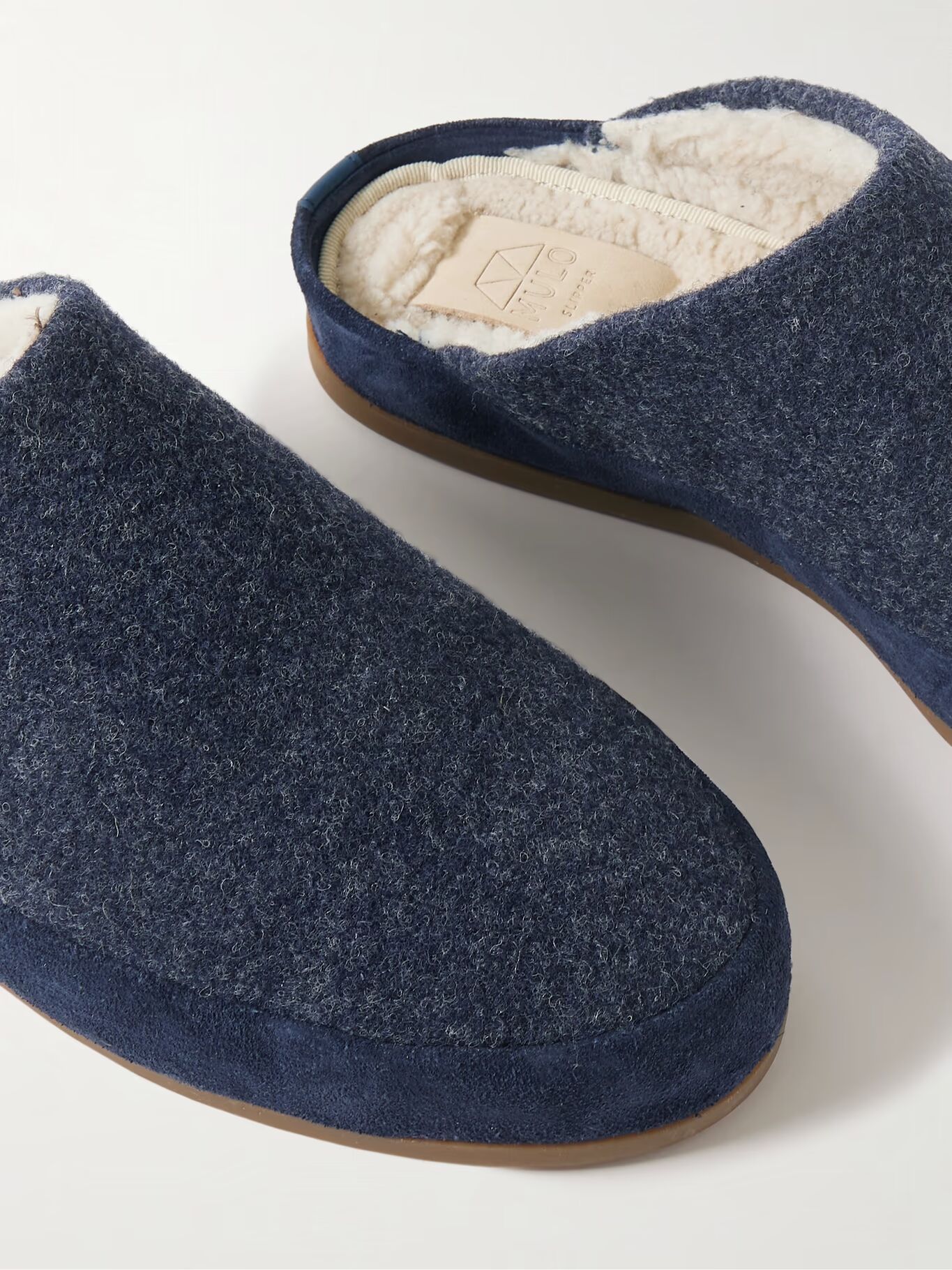 Тапочки из шерсти с замшевой отделкой и подкладкой из овчины MULO, темно-синий
Тапочки из шерсти с замшевой отделкой и подкладкой из овчины MULO, темно-синий