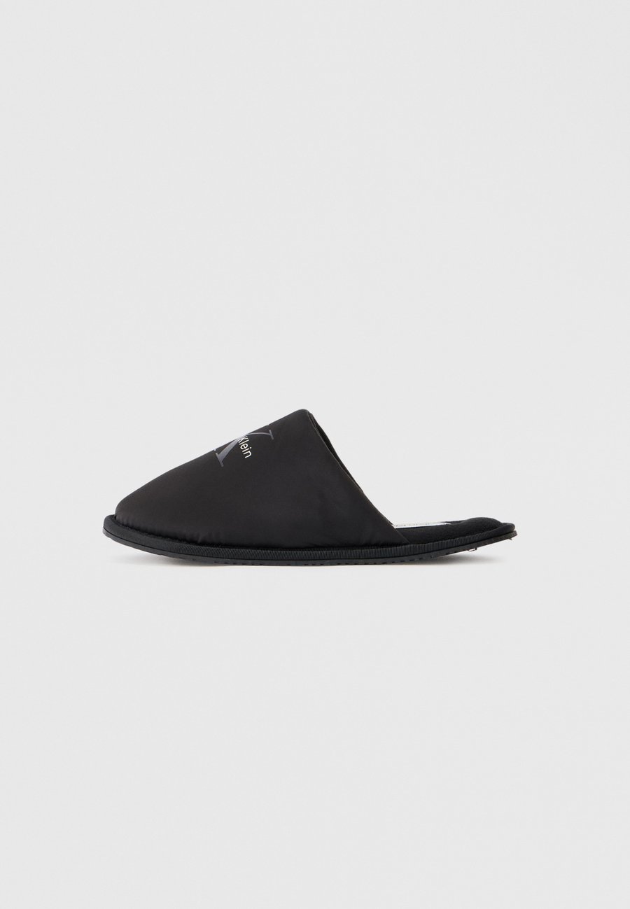 Тапочки Calvin Klein HOTEL , Triple Black/Black
Тапочки Calvin Klein HOTEL , Triple Black/Black