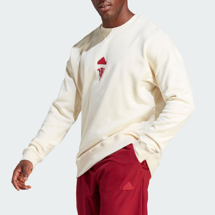Мужская футбольная толстовка Manchester United LFSTLR Adidas, слоновая кость 
Мужская футбольная толстовка Manchester United LFSTLR Adidas, слоновая кость