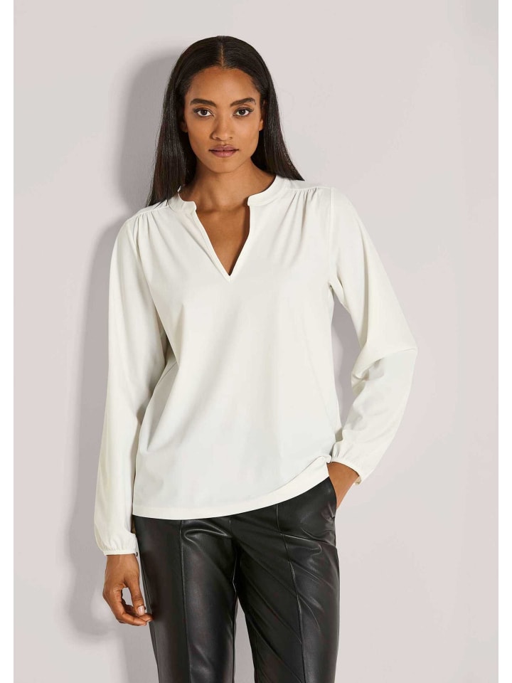 MADELEINE Трикотажная блузка с круглым вырезом, кремового цвета
MADELEINE Трикотажная блузка с круглым вырезом, кремового цвета