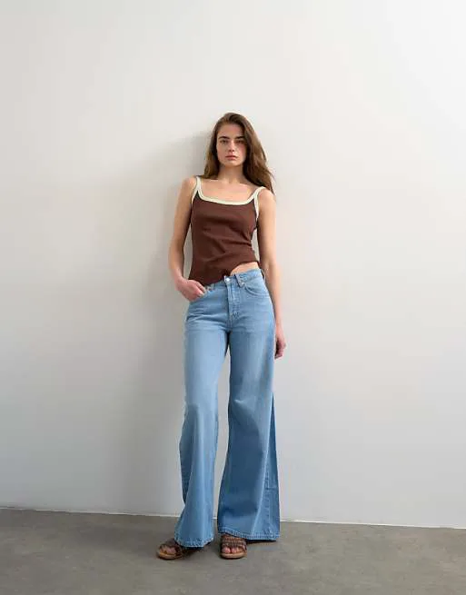 Белые джинсы со средней посадкой и широкими штанинами Topshop Horizon
Белые джинсы со средней посадкой и широкими штанинами Topshop Horizon