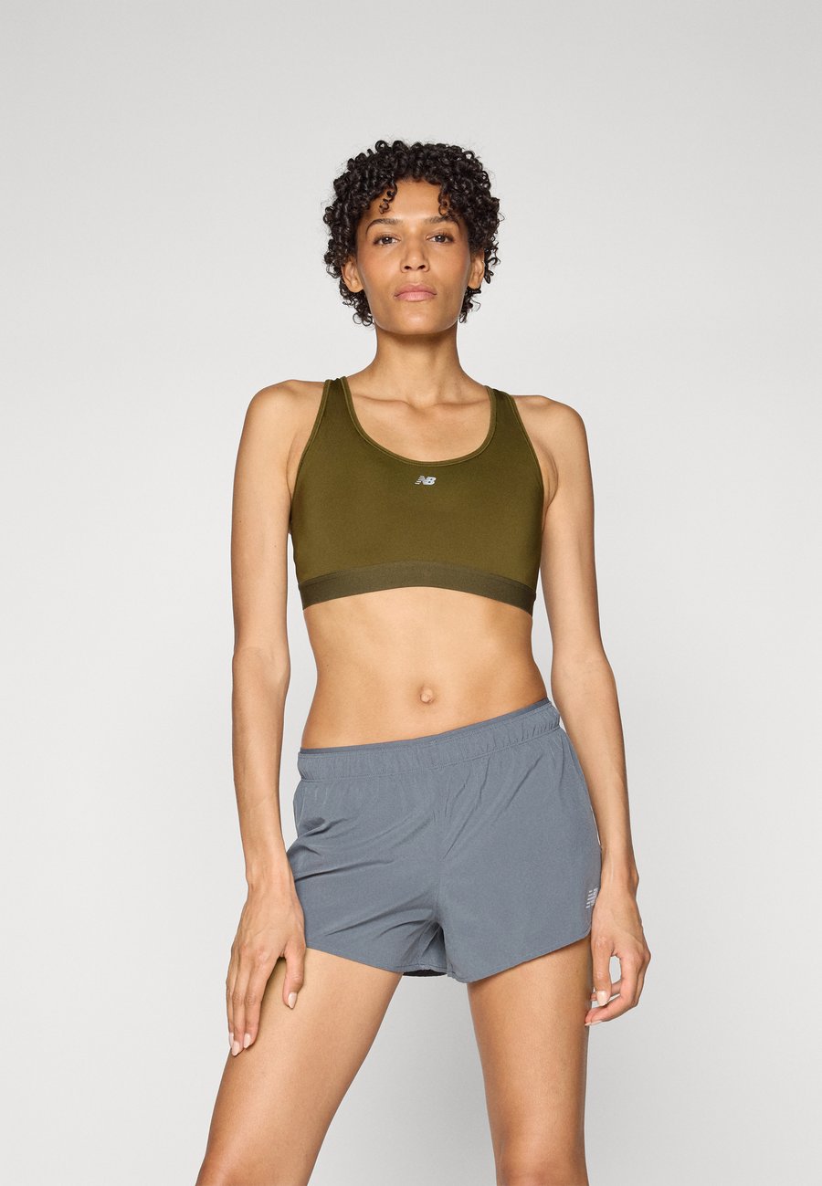 Бюстгальтер New Balance NB ESSENTIAL RUN, Woodland/Brown
Бюстгальтер New Balance NB ESSENTIAL RUN, Woodland/Brown