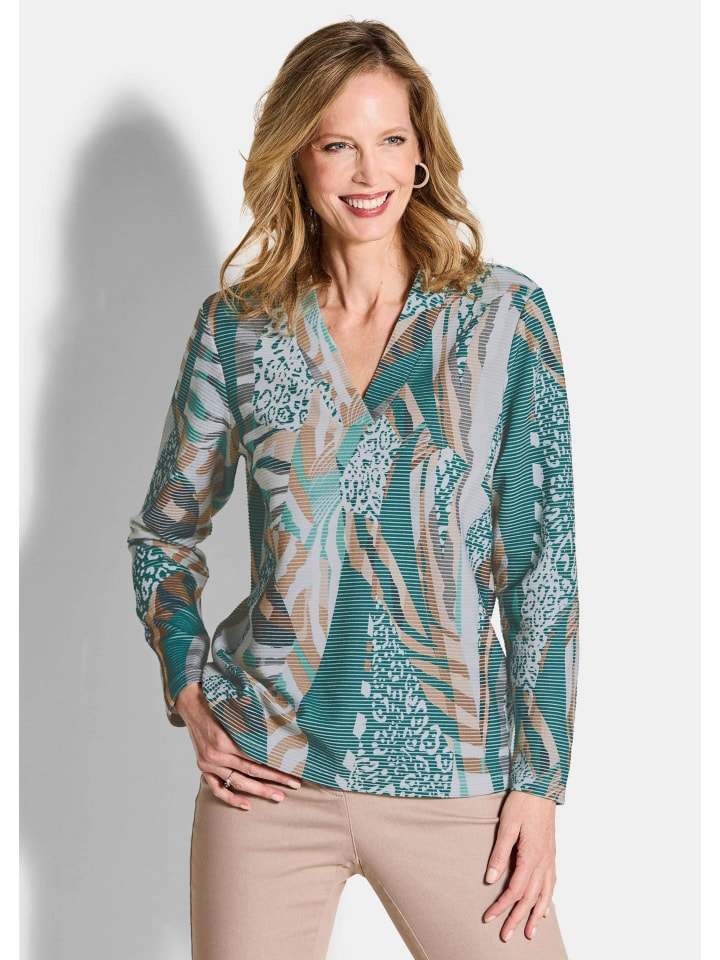 Толстовка с длинными рукавами и V-образным вырезом серо-зеленого цвета с рисунком GOLDNER
Толстовка с длинными рукавами и V-образным вырезом серо-зеленого цвета с рисунком GOLDNER