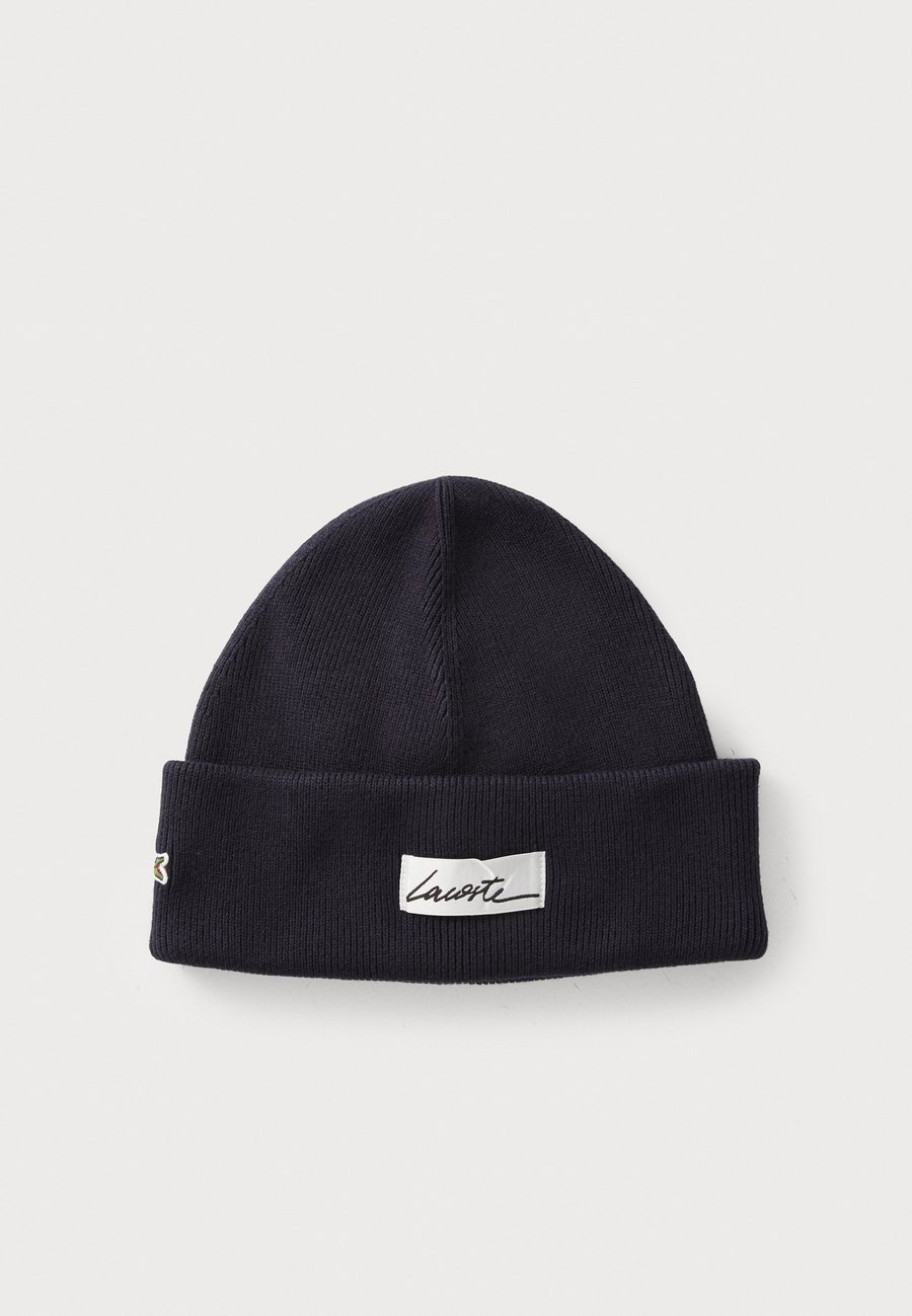 Шапка Lacoste BONNET UNISEX, Navy Blue/Dark Blue
Шапка Lacoste BONNET UNISEX, Navy Blue/Dark Blue