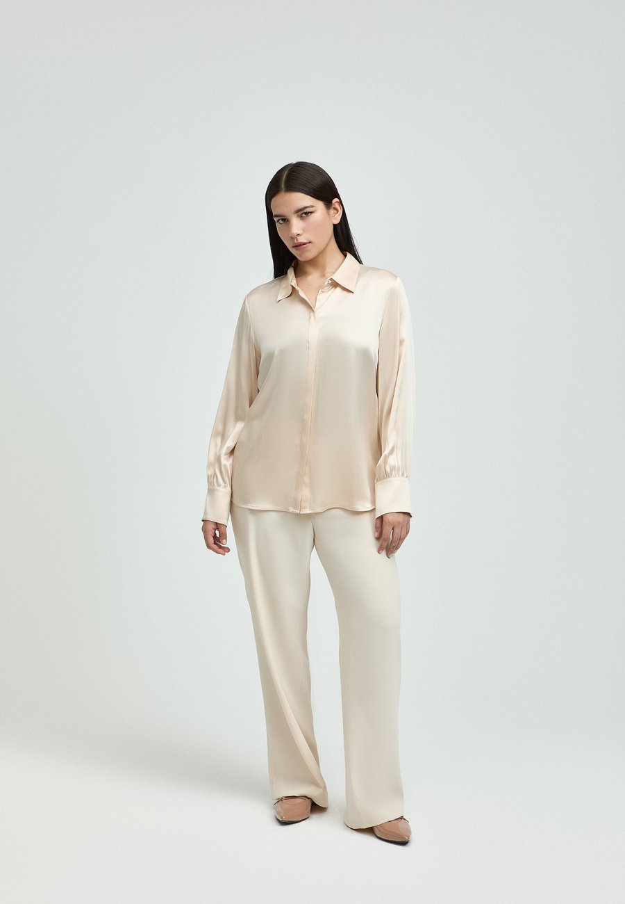 Брюки Xandres PHOCAS, Almond Milk/Beige
Брюки Xandres PHOCAS, Almond Milk/Beige