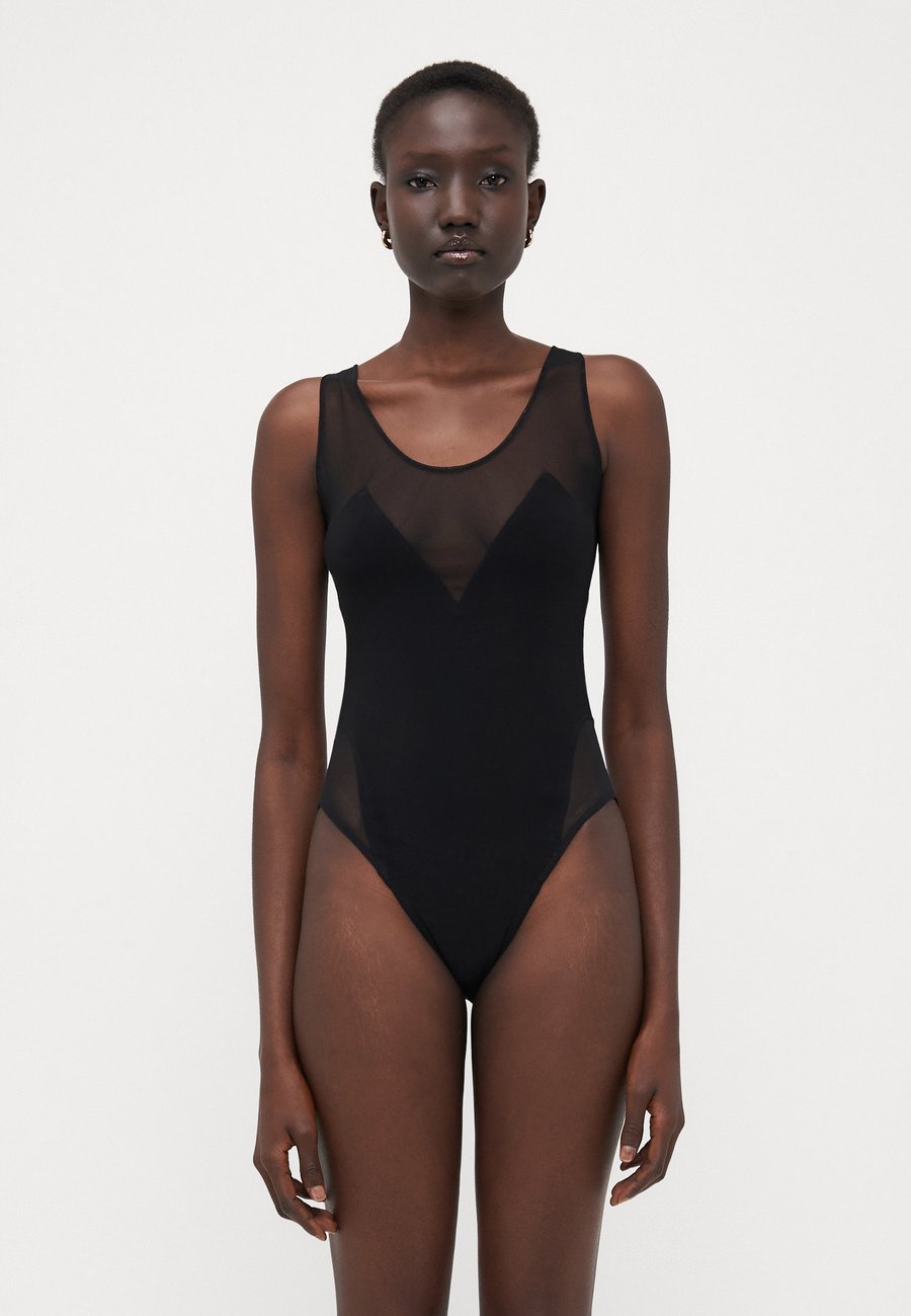 Купальник Norma Kamali LOW BACK RACER MIO, Black
Купальник Norma Kamali LOW BACK RACER MIO, Black