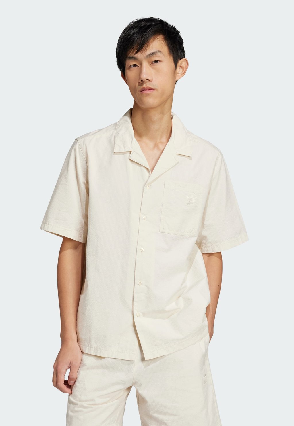 Рубашка ESS adidas Originals, молочный 
Рубашка ESS adidas Originals, молочный