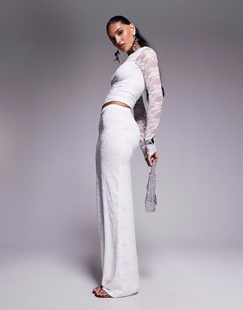 Эксклюзивная двухслойная облегающая кружевная юбка-макси от Kaiia белого цвета 
Эксклюзивная двухслойная облегающая кружевная юбка-макси от Kaiia белого цвета