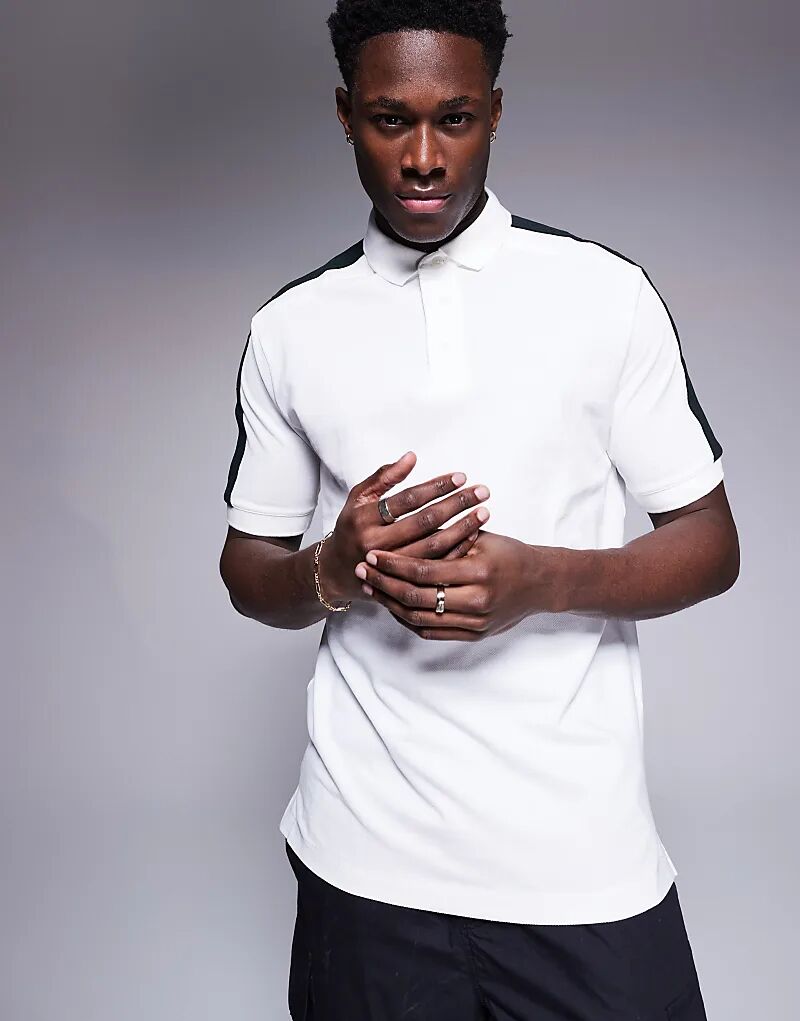 Рубашка поло с контрастной тесьмой с логотипом белого цвета Armani Exchange
Рубашка поло с контрастной тесьмой с логотипом белого цвета Armani Exchange