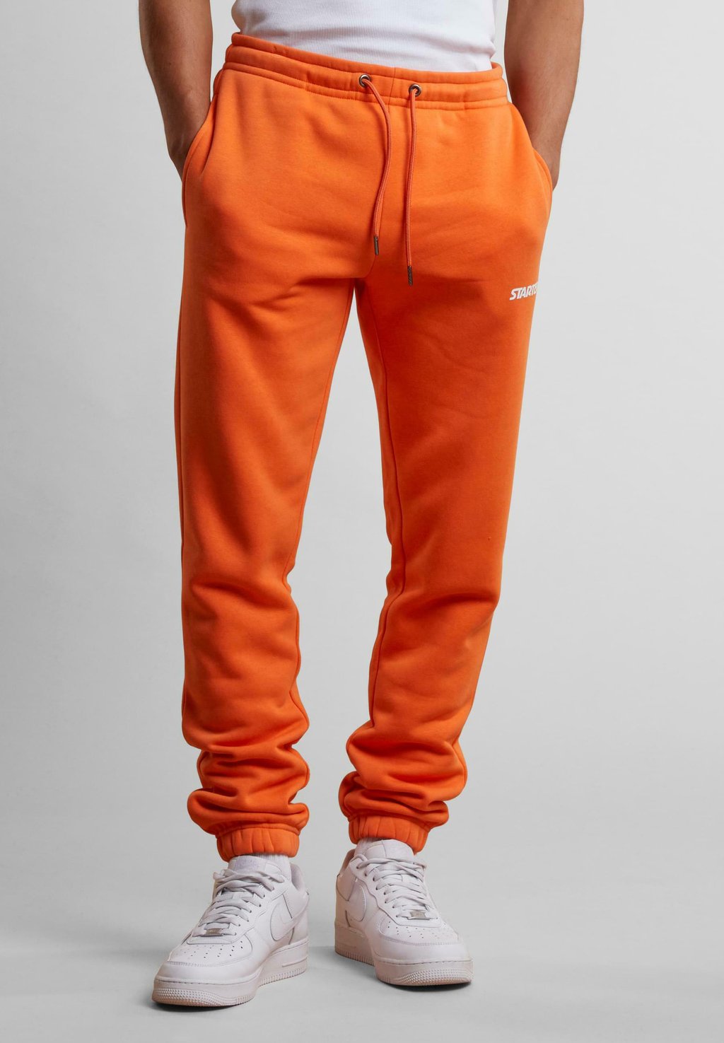 Спортивные штаны SMALL LOGO ESSENTIAL Starter, оранжевый
Спортивные штаны SMALL LOGO ESSENTIAL Starter, оранжевый