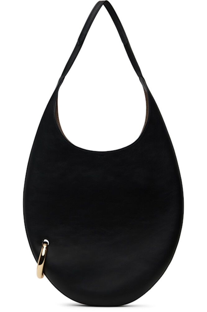 Черная сумка с пирсингом Tory Burch 
Черная сумка с пирсингом Tory Burch