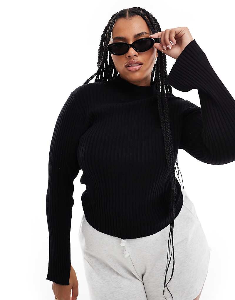 Черный джемпер с высоким воротником и разрезными рукавами Threadbare Plus
Черный джемпер с высоким воротником и разрезными рукавами Threadbare Plus