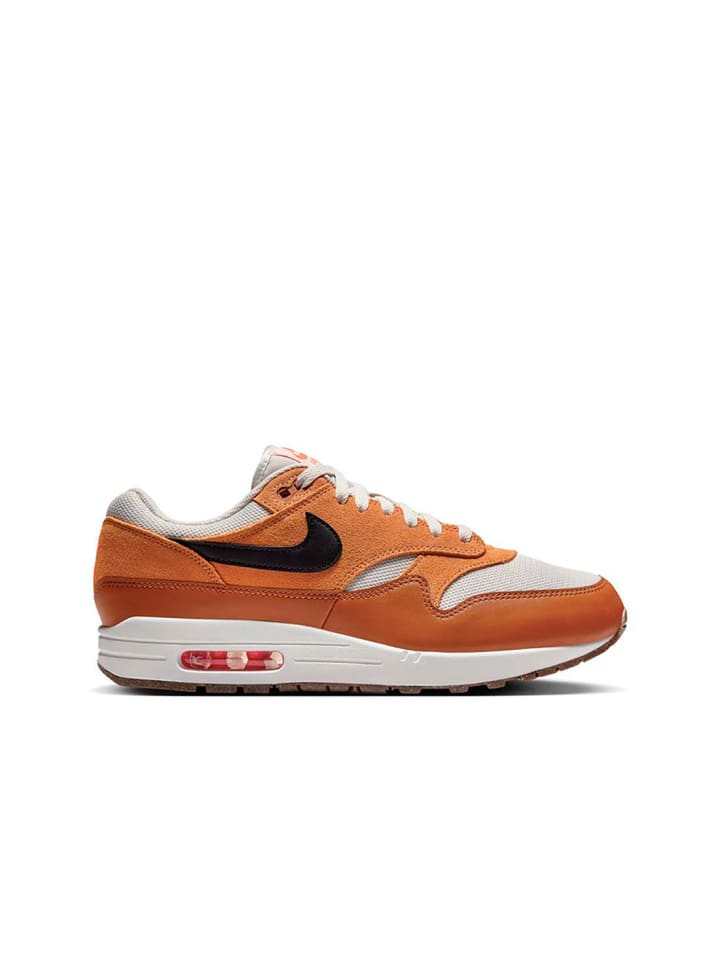 Кроссовки Air коричневого цвета Nike
Кроссовки Air коричневого цвета Nike