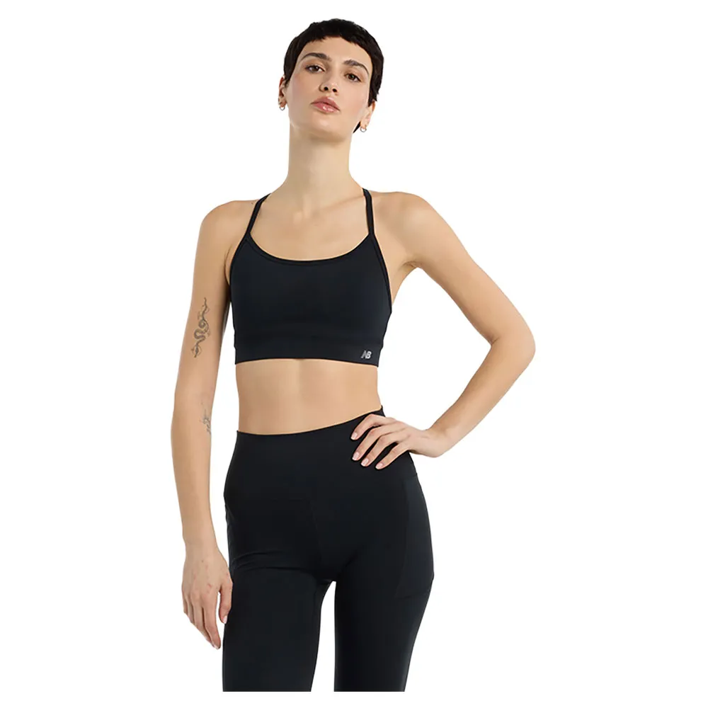 Спортивный бюстгальтер New Balance Essential Yoga sports bra, черный
Спортивный бюстгальтер New Balance Essential Yoga sports bra, черный