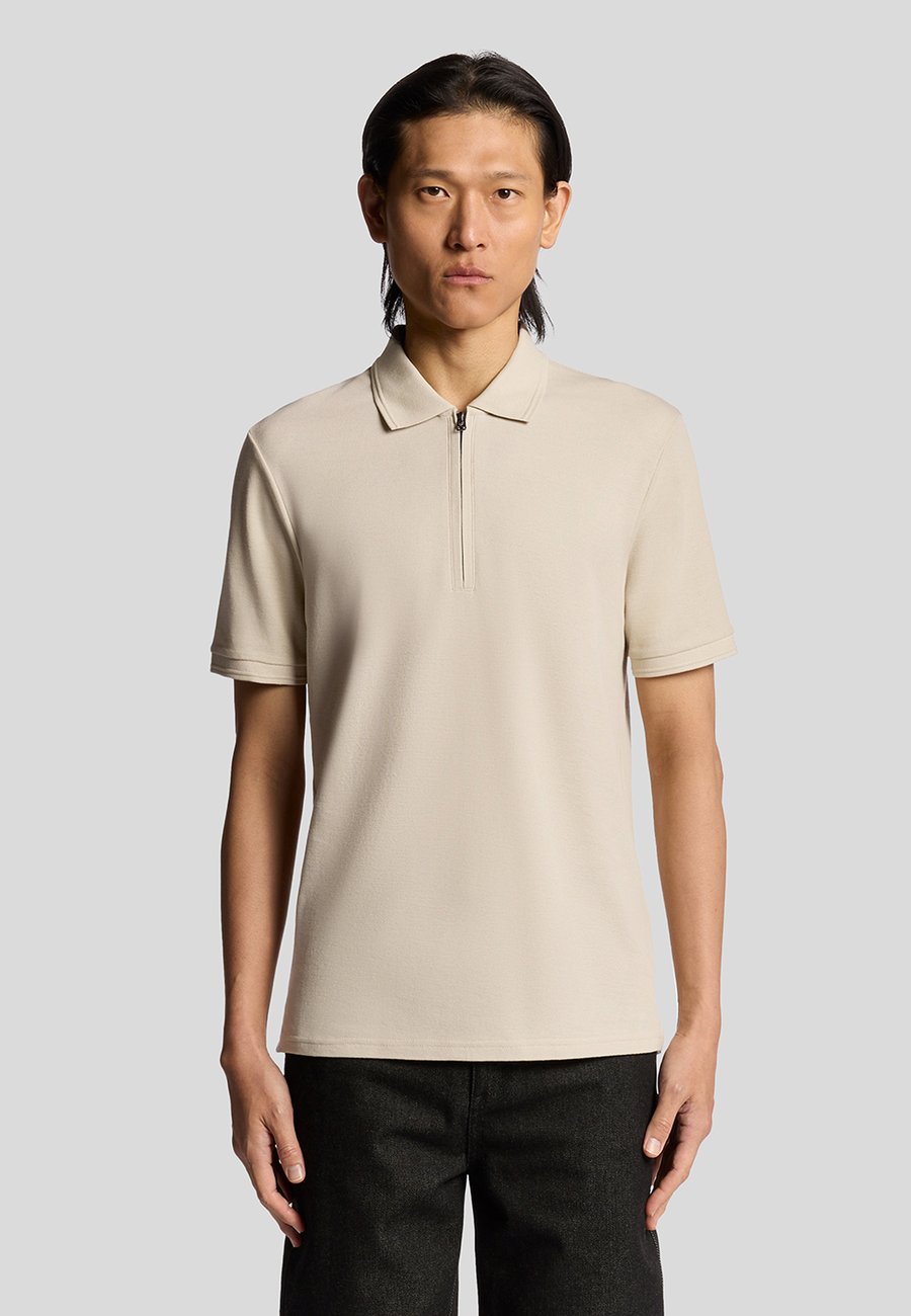 Поло Lyle & Scott OTTOMAN HALF ZIP, X865 Grey Taupe/Taupe
Поло Lyle & Scott OTTOMAN HALF ZIP, X865 Grey Taupe/Taupe