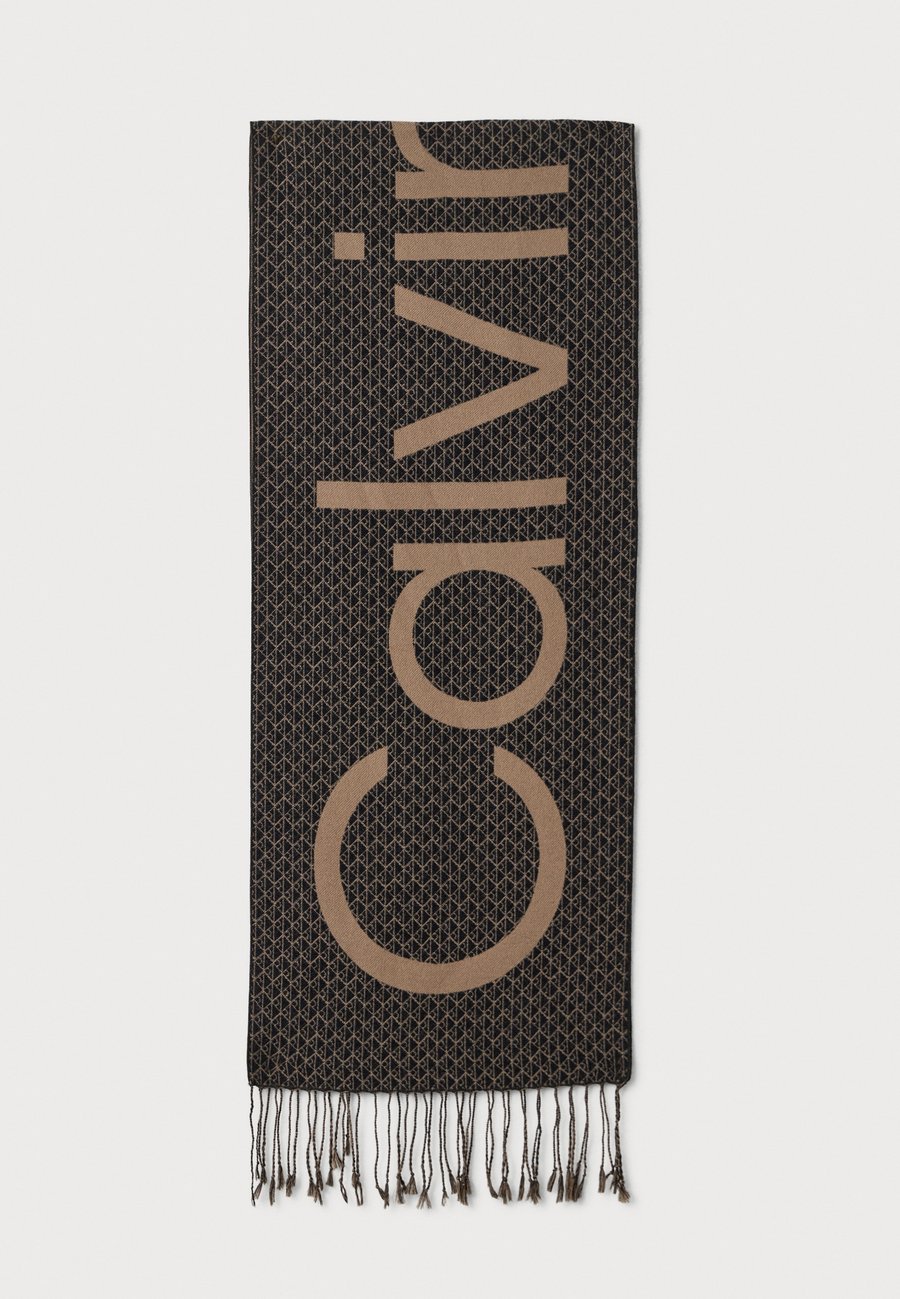 Шарф Calvin Klein EMBLEM BOLD LOGO FRINGE WOVEN SCARF UNISEX, Black
Шарф Calvin Klein EMBLEM BOLD LOGO FRINGE WOVEN SCARF UNISEX, Black