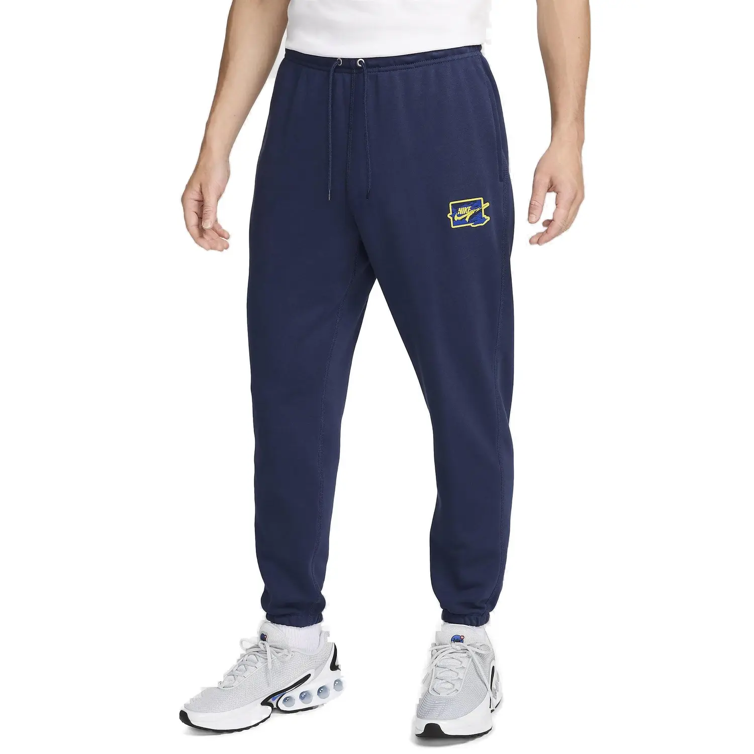 Повседневные брюки мужские темно-синие / светящиеся желтые Nike, синий/желтый 
Повседневные брюки мужские темно-синие / светящиеся желтые Nike, синий/желтый