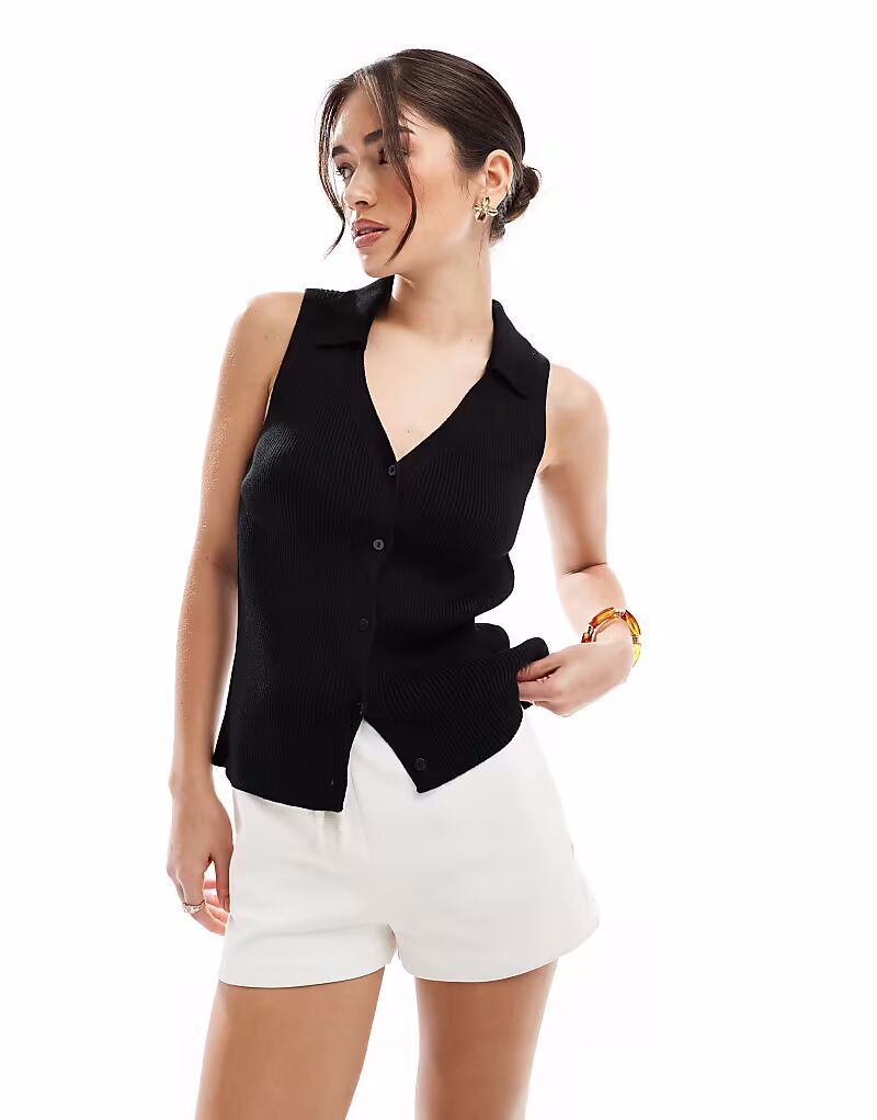 Трикотажный топ с ребристым воротником ASOS DESIGN черного цвета
Трикотажный топ с ребристым воротником ASOS DESIGN черного цвета