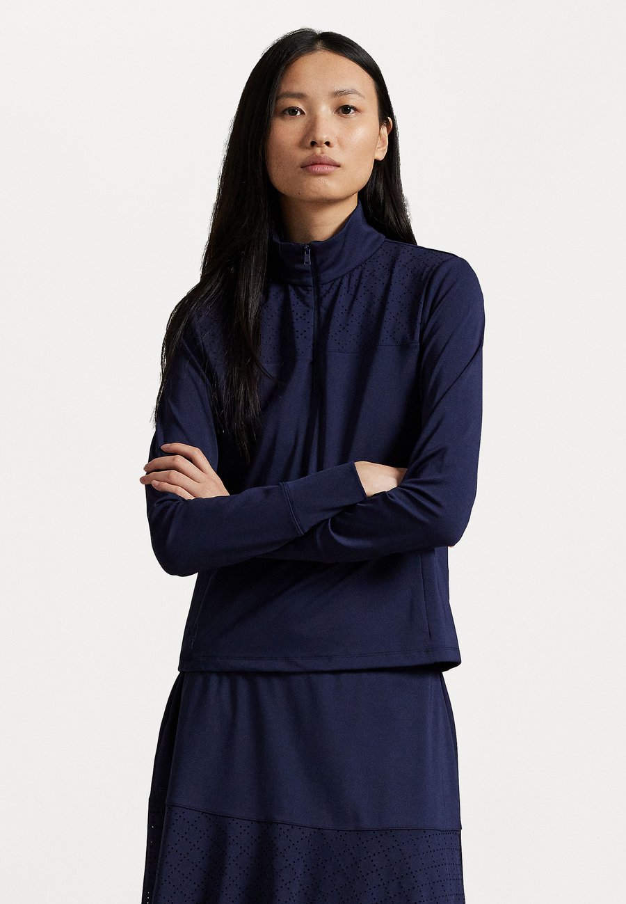 Топ Polo Ralph Lauren EYELET-PANEL INTERLOCK QUARTER-ZIP, Refined Navy/Dark Blue
Топ Polo Ralph Lauren EYELET-PANEL INTERLOCK QUARTER-ZIP, Refined Navy/Dark Blue