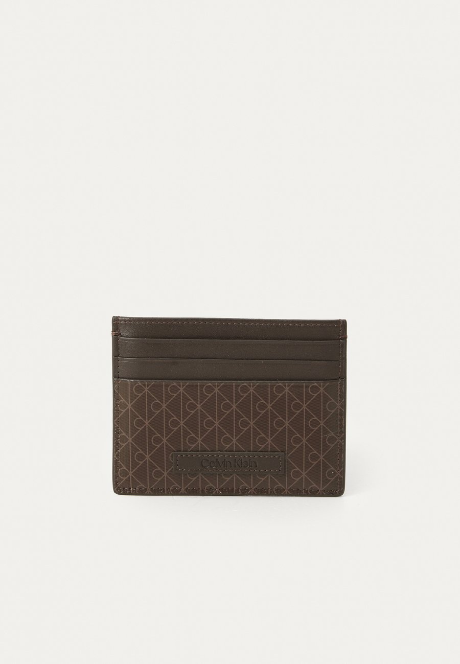 Кошелек Calvin Klein COATED EMBLEM, Mulch/Brown
Кошелек Calvin Klein COATED EMBLEM, Mulch/Brown