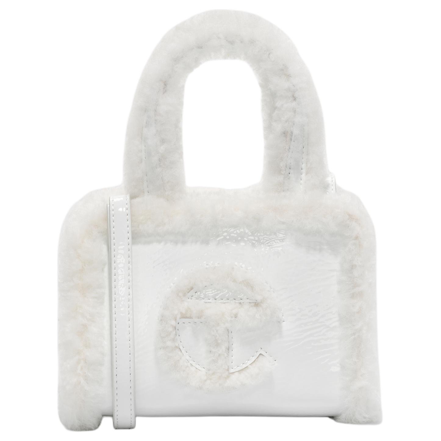 UGG Telfar Collaboration Сумка через плечо из коровьей кожи с овчиной, кроссбоди, маленькая женская сумка белого цвета
UGG Telfar Collaboration Сумка через плечо из коровьей кожи с овчиной, кроссбоди, маленькая женская сумка белого цвета