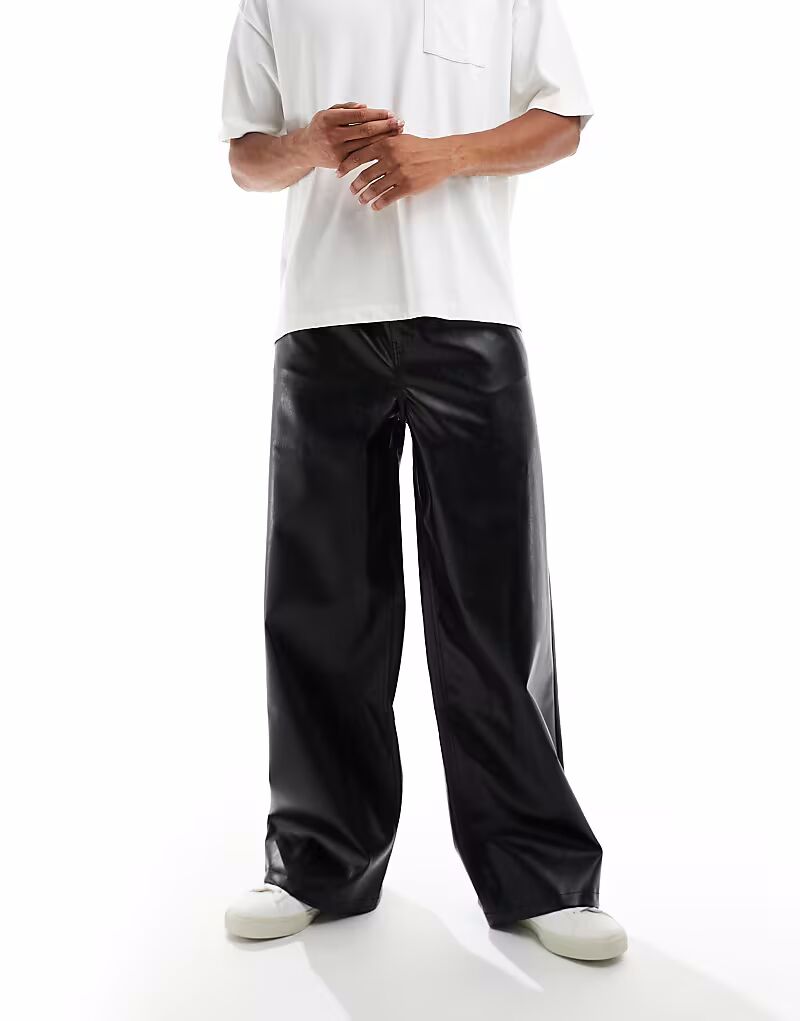 Свободные брюки из черной искусственной кожи Asos Design
Свободные брюки из черной искусственной кожи Asos Design