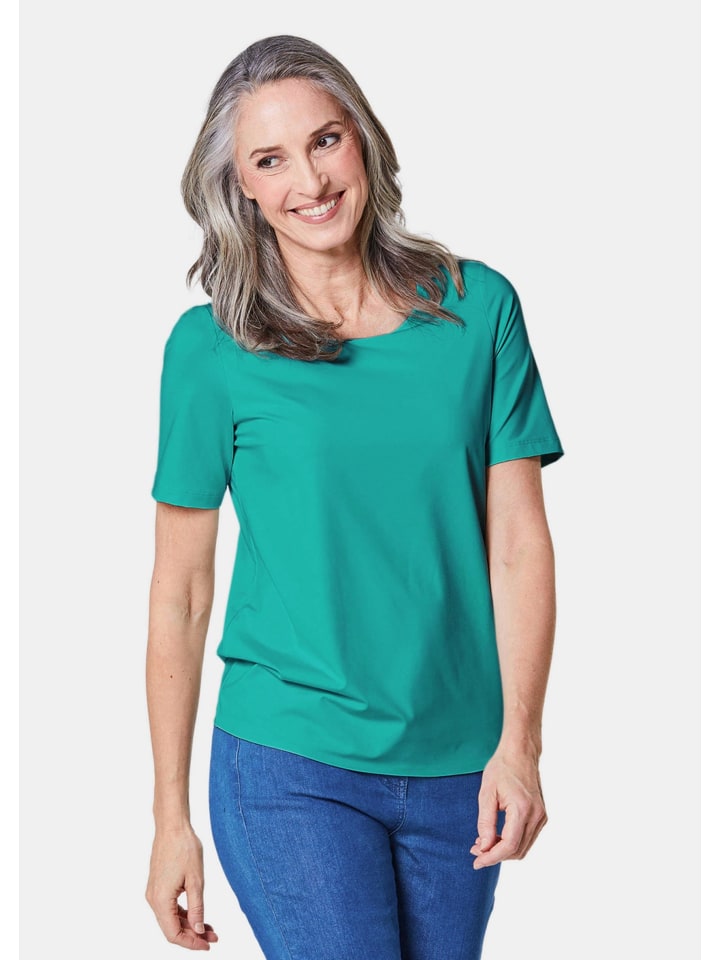 Рубашка в хорошем состоянии из ткани, сохраняющей форму, бирюзового цвета. GOLDNER
Рубашка в хорошем состоянии из ткани, сохраняющей форму, бирюзового цвета. GOLDNER