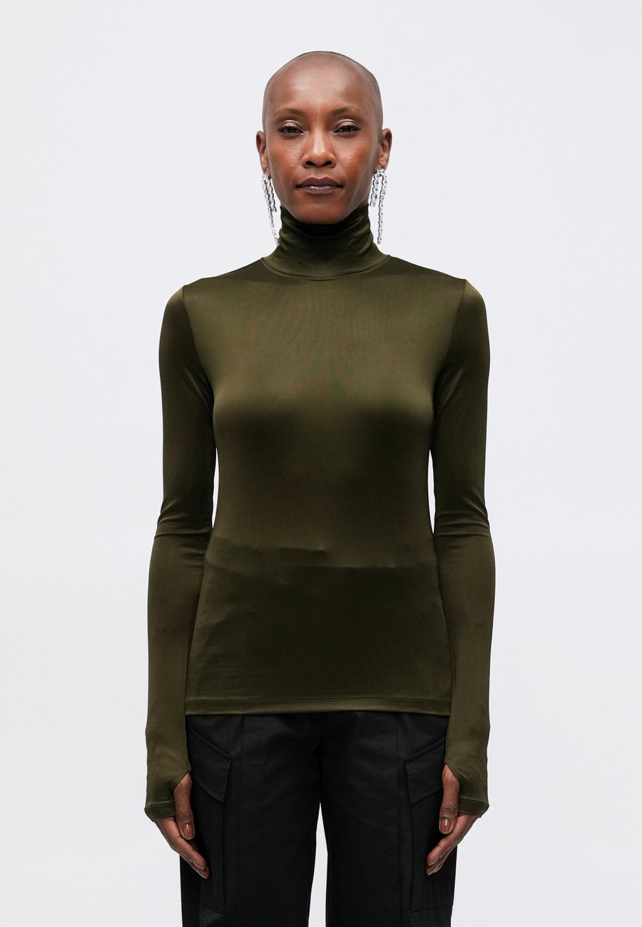 Топ Filippa K FITTED TURTLENECK, Dark Khaki/Khaki
Топ Filippa K FITTED TURTLENECK, Dark Khaki/Khaki