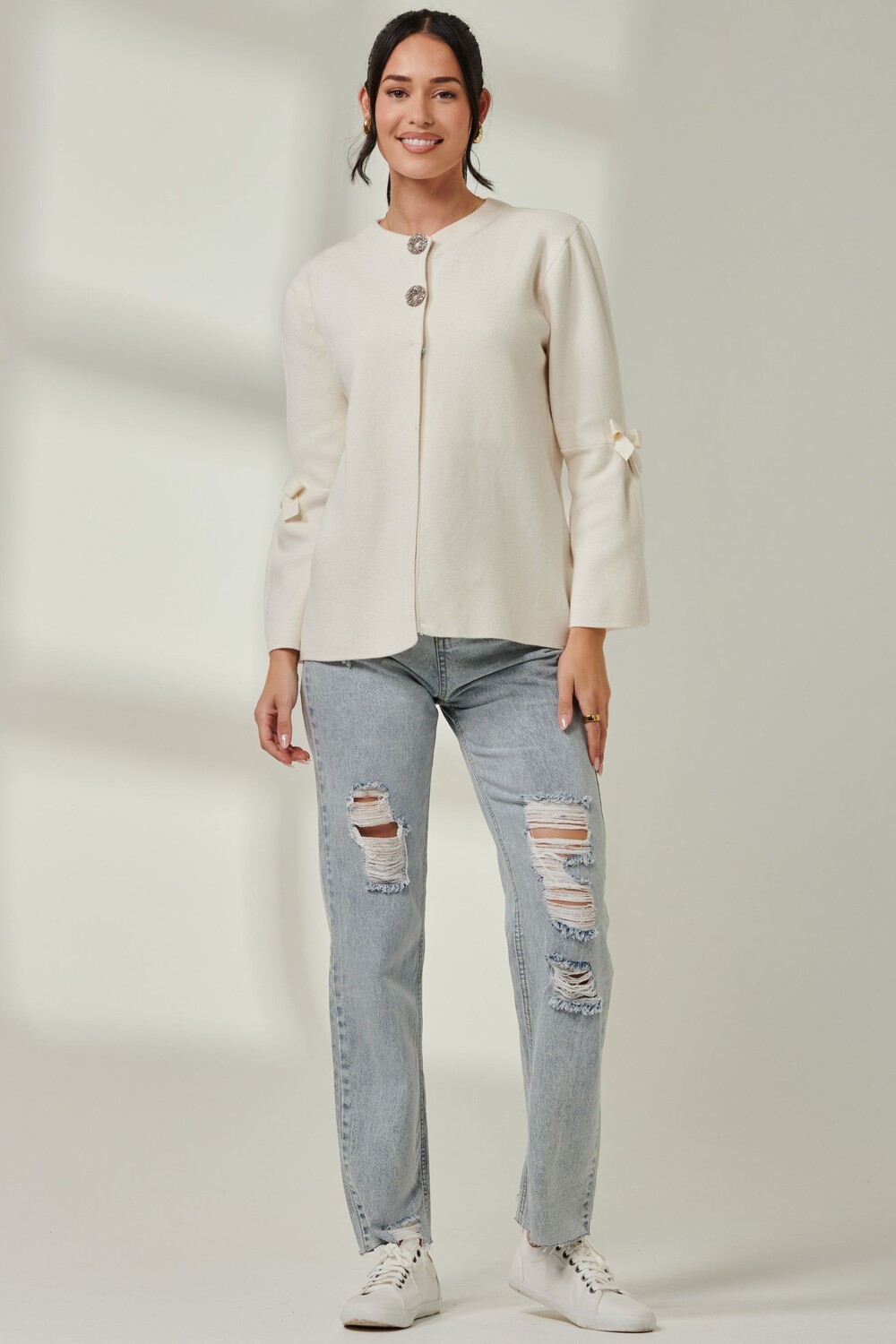 Вязаный кардиган с бантом Jolie Moi, бежевый
Вязаный кардиган с бантом Jolie Moi, бежевый