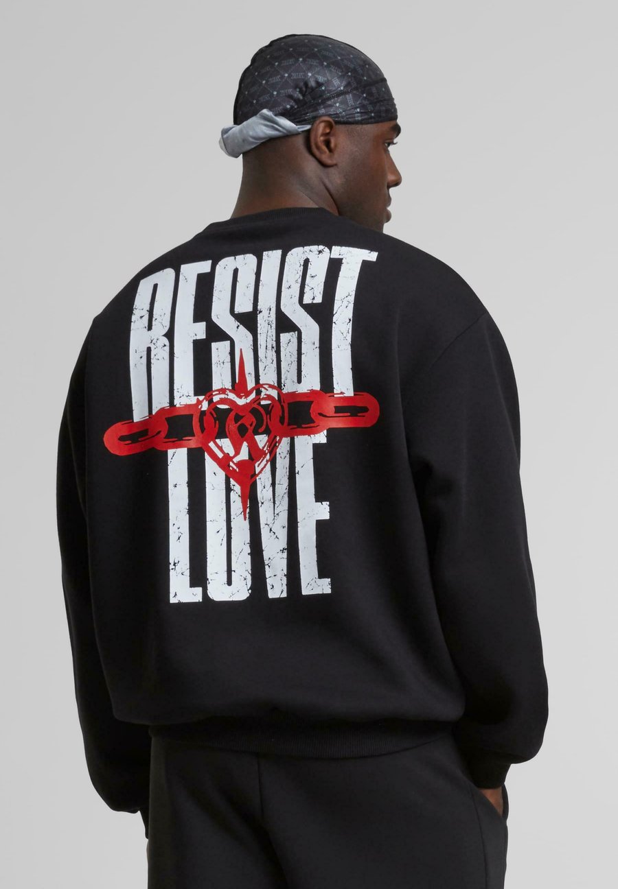 Толстовка Karl Kani SIGNATURE RESIST LOVE CREW, Black
Толстовка Karl Kani SIGNATURE RESIST LOVE CREW, Black
