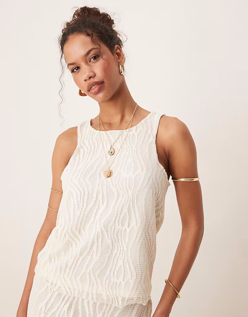 Текстурированная майка Vila кремового цвета
Текстурированная майка Vila кремового цвета