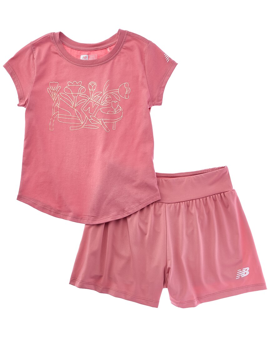Комплект New Balance из двух предметов: футболка и свободные шорты, розовый
Комплект New Balance из двух предметов: футболка и свободные шорты, розовый