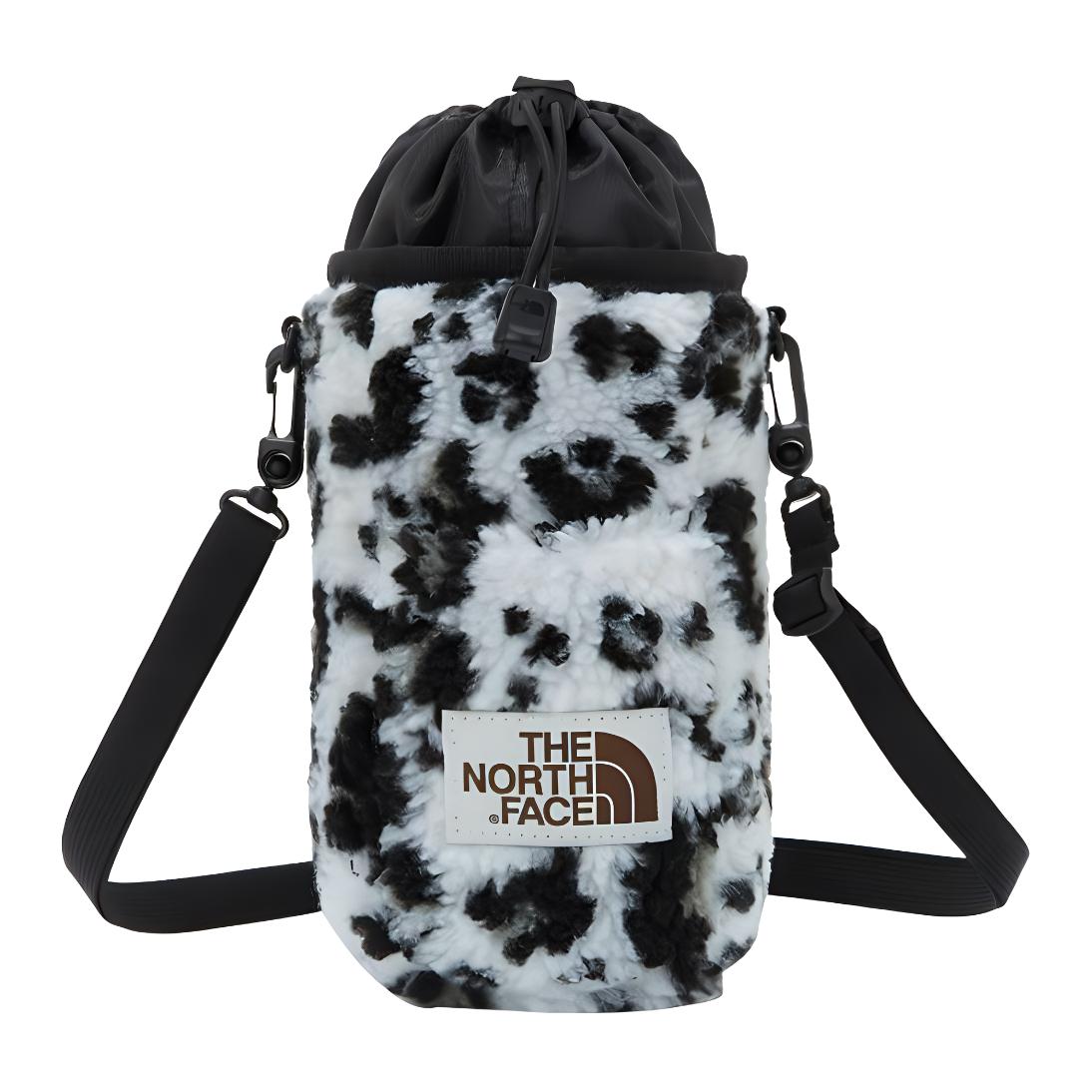 Сумка для бутылки воды, наплечная сумка, кроссбоди из полярного флиса шерпа черно-белый леопардовый принт унисекс THE NORTH FACE 
Сумка для бутылки воды, наплечная сумка, кроссбоди из полярного флиса шерпа черно-белый леопардовый принт унисекс THE NORTH FACE