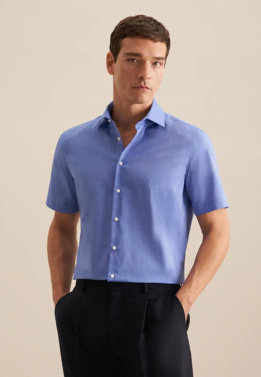 Seidensticker деловая рубашка "Shaped", фасонный с короткими рукавами воротник Кент однотонный, синий
Seidensticker деловая рубашка "Shaped", фасонный с короткими рукавами воротник Кент однотонный, синий