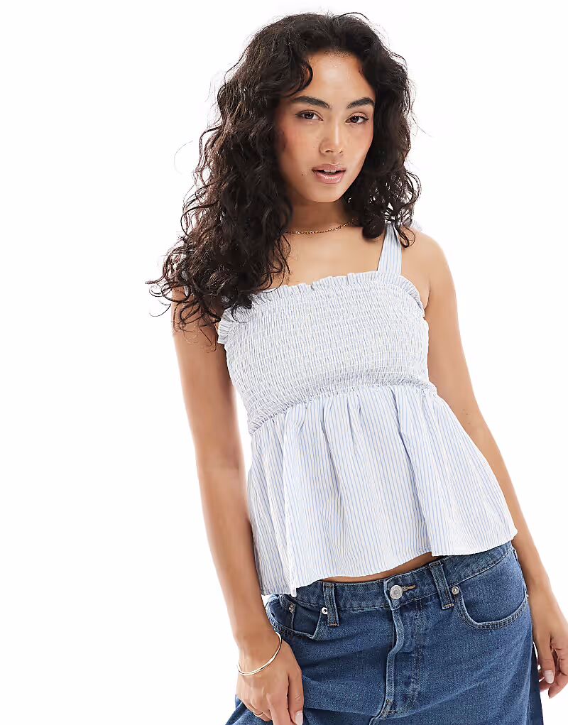 Топ Brave Soul из хлопковой смеси на бретелях с присборенными краями в сине-белую полоску
Топ Brave Soul из хлопковой смеси на бретелях с присборенными краями в сине-белую полоску