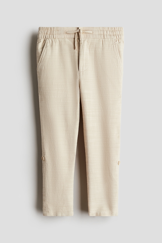 Подвернутые хлопковые брюки-чинос H&M, бежевый
Подвернутые хлопковые брюки-чинос H&M, бежевый