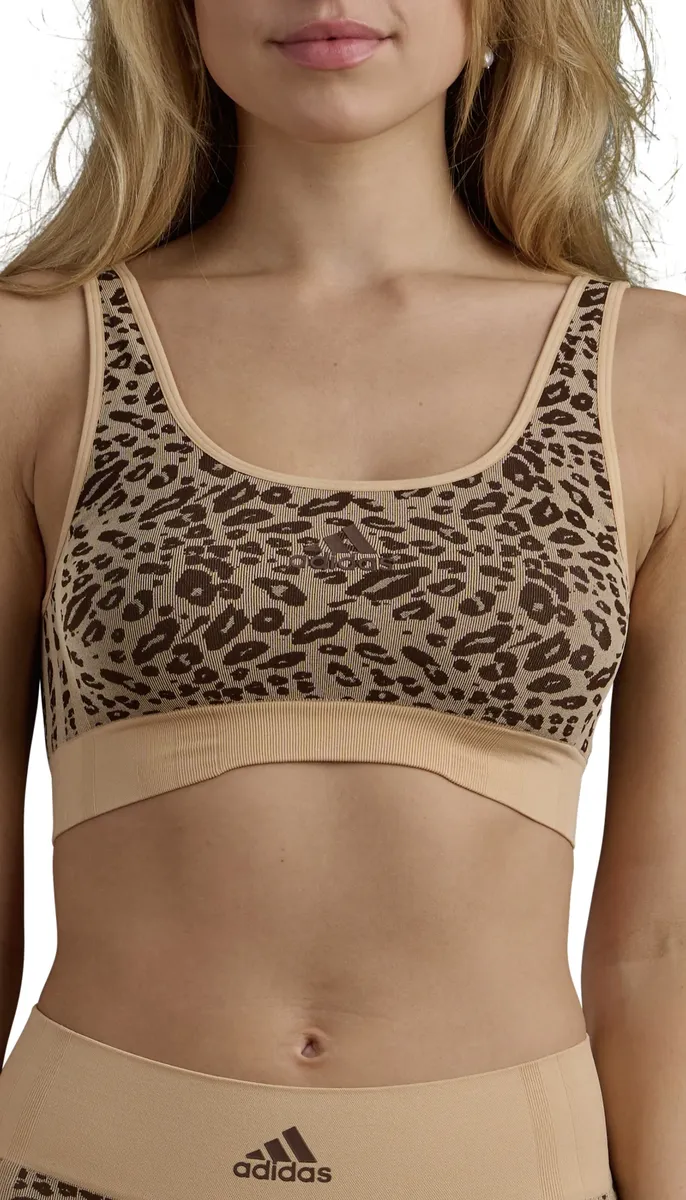 Бюстье Adidas Sportswear со съемными подушечками и анималистическим рисунком, цвет Animal Print
Бюстье Adidas Sportswear со съемными подушечками и анималистическим рисунком, цвет Animal Print