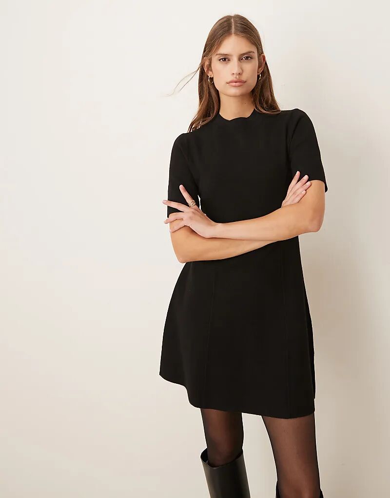 Мини-платье Mango с короткими рукавами и расклешенной юбкой черного цвета
Мини-платье Mango с короткими рукавами и расклешенной юбкой черного цвета