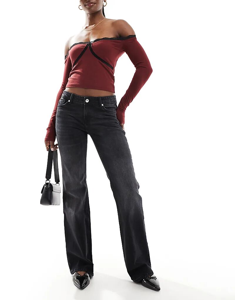 Расклешенные джинсы с низкой посадкой черного цвета Bershka
Расклешенные джинсы с низкой посадкой черного цвета Bershka