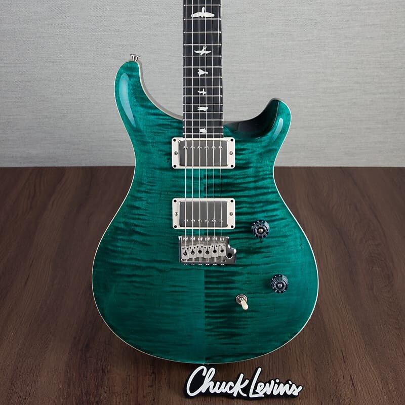 Электрогитара PRS CE24 Flame Maple Electric Guitar, Ebony Fingerboard - Turquoise - CHUCKSCLUSIVE - #230365097 - Display Model
Электрогитара PRS CE24 Flame Maple Electric Guitar, Ebony Fingerboard - Turquoise - CHUCKSCLUSIVE - #230365097 - Display Model