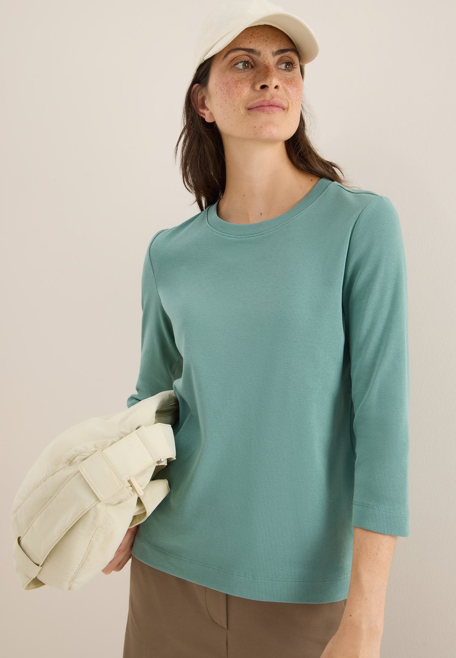 Топ Cecil MIT RIPPSTRUKTUR, Grün/Green
Топ Cecil MIT RIPPSTRUKTUR, Grün/Green