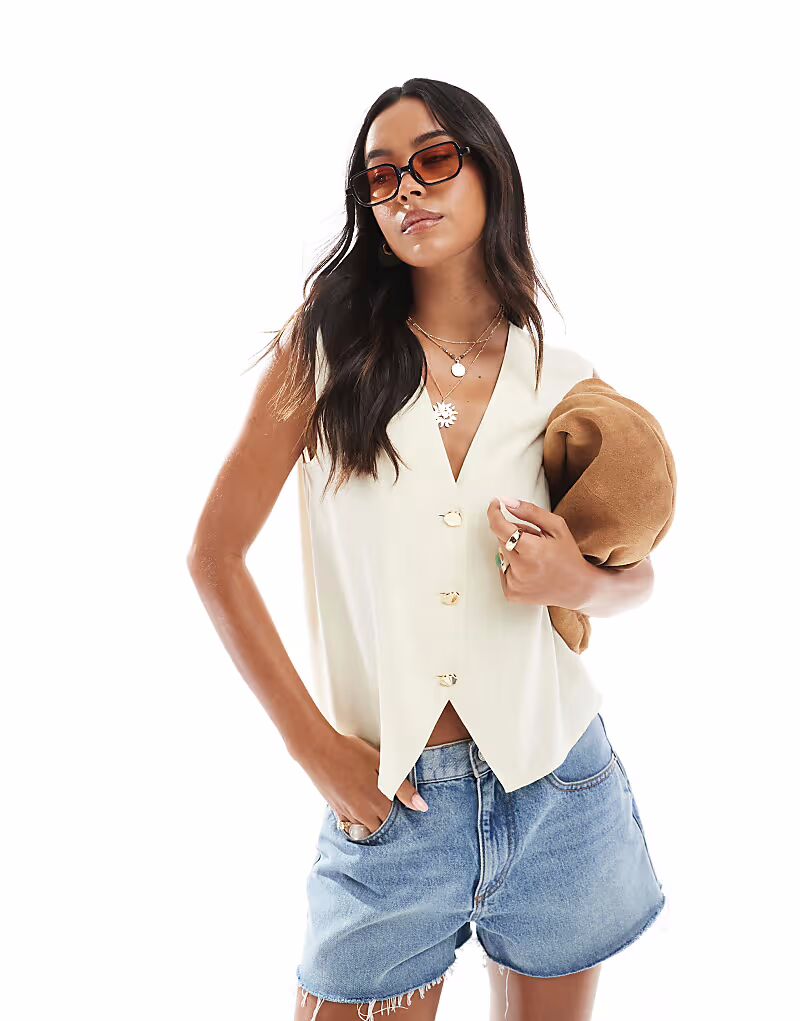 Жилет свободного кроя ASOS DESIGN кремового цвета
Жилет свободного кроя ASOS DESIGN кремового цвета