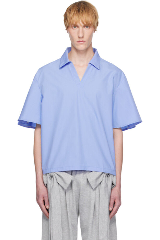 Синяя рубашка из поплина с V-образным вырезом ANDREJ GRONAU
Синяя рубашка из поплина с V-образным вырезом ANDREJ GRONAU