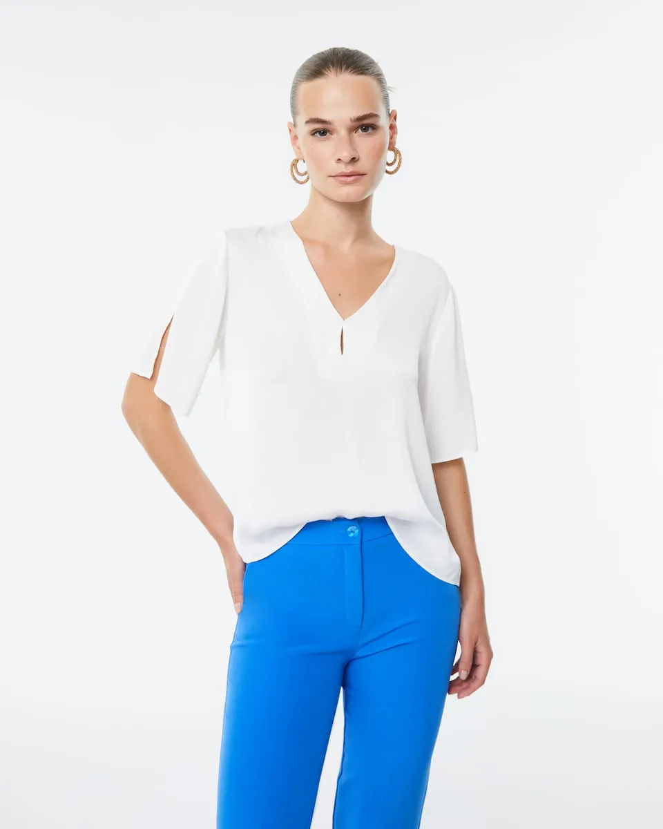 Женская блузка с коротким рукавом и V-образным вырезом с разрезом Paz Torras, белый
Женская блузка с коротким рукавом и V-образным вырезом с разрезом Paz Torras, белый